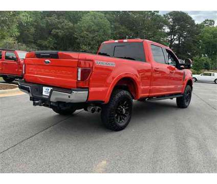 2022 Ford F-250SD Lariat is a Red 2022 Ford F-250 Lariat Truck in Bogart GA