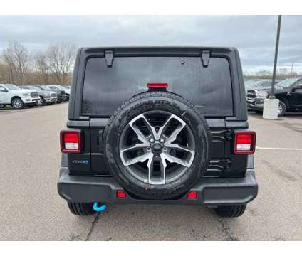 2024 Jeep Wrangler Sport S 4xe is a Black 2024 Jeep Wrangler Sport SUV in Oswego NY