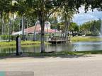 731 Lyons Rd #16207, Coconut Creek, FL 33063