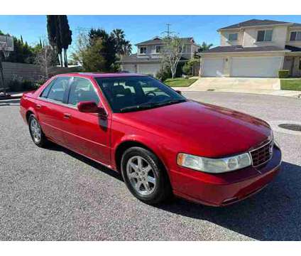 2002 Cadillac Seville for sale is a Red 2002 Cadillac Seville Car for Sale in North Hollywood CA