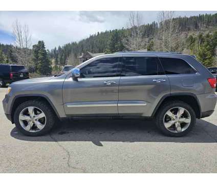 2012 Jeep Grand Cherokee for sale is a Grey 2012 Jeep grand cherokee Car for Sale in Breckenridge CO