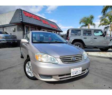 2003 Toyota Corolla for sale is a Gold 2003 Toyota Corolla Car for Sale in Bloomington CA