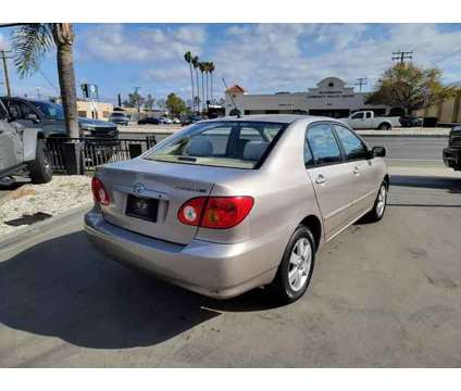 2003 Toyota Corolla for sale is a Gold 2003 Toyota Corolla Car for Sale in Bloomington CA