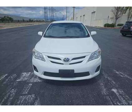 2011 Toyota Corolla for sale is a White 2011 Toyota Corolla Car for Sale in Chino CA