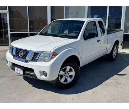 2013 Nissan Frontier King Cab for sale is a White 2013 Nissan frontier King Cab Car for Sale in Menifee CA