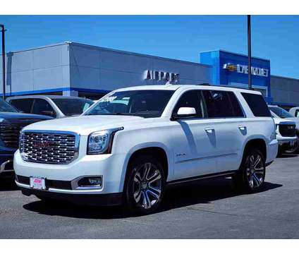 2019UsedGMCUsedYukonUsed4WD 4dr is a White 2019 GMC Yukon Car for Sale in Medford OR