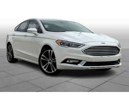 2017UsedFordUsedFusion is a Silver, White 2017 Ford Fusion Car for Sale in Houston TX
