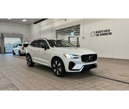 2024 Volvo XC60 Recharge Plug-In Hybrid Plus Dark Theme is a White 2024 Volvo XC60 3.2 Trim Hybrid in Barrington IL