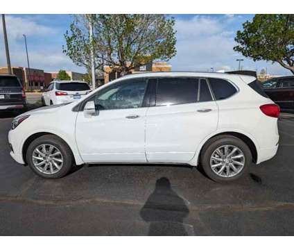 2020 Buick Envision Essence is a White 2020 Buick Envision Essence Car for Sale in Aurora CO