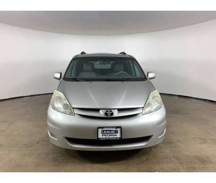 2010 Toyota Sienna XLE is a Silver 2010 Toyota Sienna XLE Car for Sale in Peoria IL