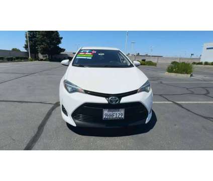 2018 Toyota Corolla is a White 2018 Toyota Corolla Car for Sale in Stockton CA
