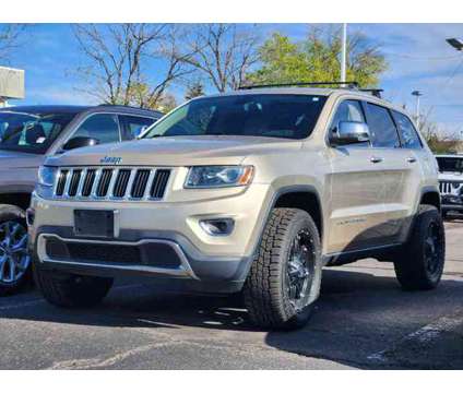 2014 Jeep Grand Cherokee Limited is a Tan 2014 Jeep grand cherokee Limited Car for Sale in Denver CO