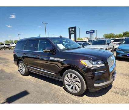 2022 Lincoln Navigator Reserve is a Black 2022 Lincoln Navigator Reserve Car for Sale in Lubbock TX
