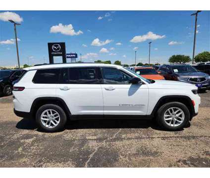 2023 Jeep Grand Cherokee L Laredo is a White 2023 Jeep grand cherokee Car for Sale in Lubbock TX