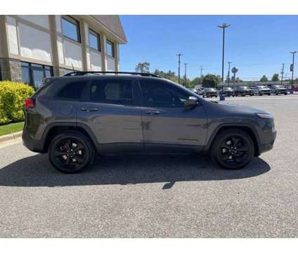 2016 Jeep Cherokee High Altitude is a Grey 2016 Jeep Cherokee Car for Sale in Traverse City MI