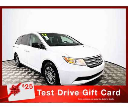 2012 Honda Odyssey EX-L is a White 2012 Honda Odyssey EX Car for Sale in Tampa FL