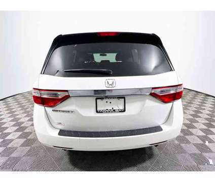 2012 Honda Odyssey EX-L is a White 2012 Honda Odyssey EX Car for Sale in Tampa FL