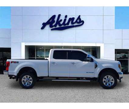 2019 Ford Super Duty F-350 SRW LARIAT is a Silver, White 2019 Ford Car for Sale in Winder GA