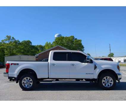 2019 Ford Super Duty F-350 SRW LARIAT is a Silver, White 2019 Ford Car for Sale in Winder GA