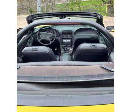 2004 Ford Mustang for sale is a Yellow 2004 Ford Mustang Car for Sale in Houston TX