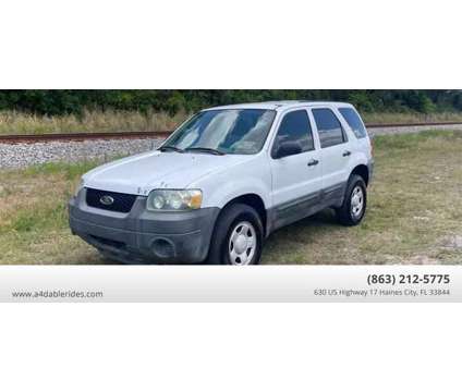 2005 Ford Escape for sale is a White 2005 Ford Escape Car for Sale in Haines City FL