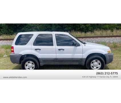 2005 Ford Escape for sale is a White 2005 Ford Escape Car for Sale in Haines City FL