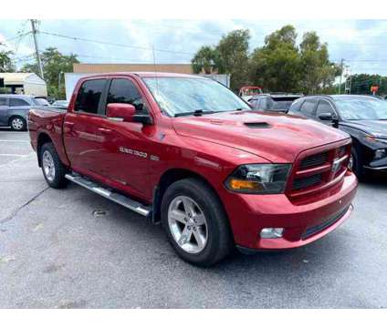 2012 Ram 1500 Crew Cab for sale is a Red 2012 RAM 1500 Model Car for Sale in Orlando FL