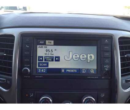 2012 Jeep Grand Cherokee Laredo is a Black, Green 2012 Jeep grand cherokee Laredo Car for Sale in Gilbert AZ