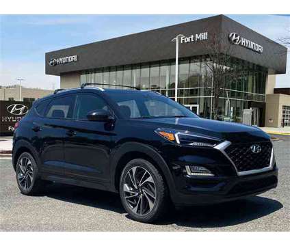 2021 Hyundai Tucson Sport is a Black 2021 Hyundai Tucson Sport SUV in Fort Mill SC