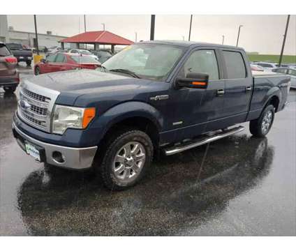 2014 Ford F-150 XLT is a Blue 2014 Ford F-150 XLT Truck in Dubuque IA