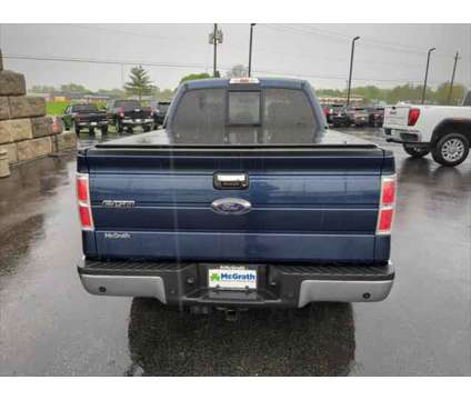2014 Ford F-150 XLT is a Blue 2014 Ford F-150 XLT Truck in Dubuque IA