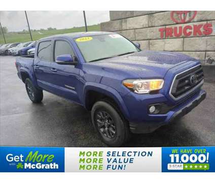 2023 Toyota Tacoma SR V6 is a Blue 2023 Toyota Tacoma SR Truck in Dubuque IA