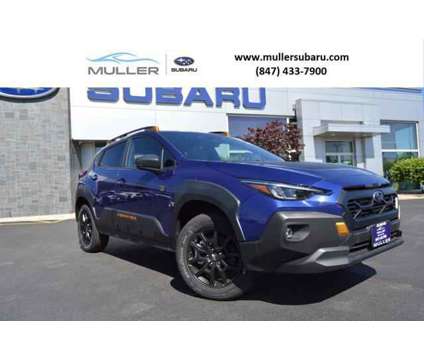 2024 Subaru Crosstrek Wilderness is a Blue 2024 Subaru Crosstrek 2.0i Station Wagon in Highland Park IL