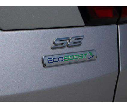2019 Ford Escape SE is a Silver 2019 Ford Escape SE SUV in Friendswood TX