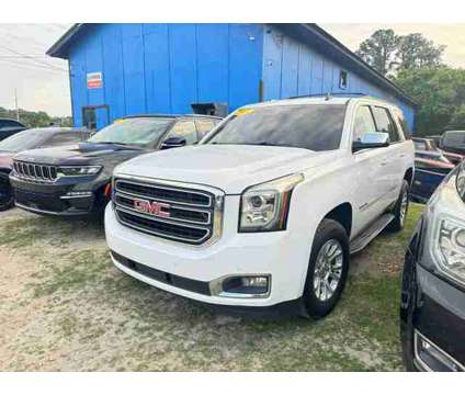 2015 GMC Yukon for sale is a White 2015 GMC Yukon 1500 2dr Car for Sale in Fayetteville NC