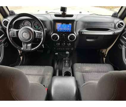 2012 Jeep Wrangler for sale is a Tan 2012 Jeep Wrangler Car for Sale in Lincoln NE