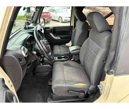 2012 Jeep Wrangler for sale is a Tan 2012 Jeep Wrangler Car for Sale in Lincoln NE