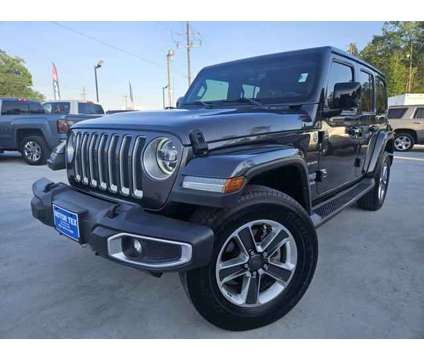 2018 Jeep Wrangler Unlimited for sale is a Grey 2018 Jeep Wrangler Unlimited Car for Sale in Porter TX