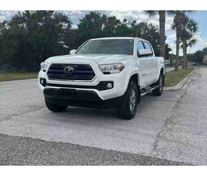 2019 Toyota Tacoma Double Cab for sale is a White 2019 Toyota Tacoma Double Cab Car for Sale in Orlando FL