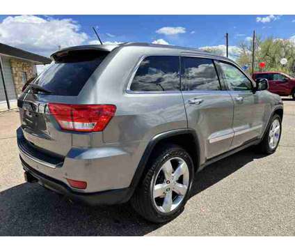 2013 Jeep Grand Cherokee for sale is a Silver 2013 Jeep grand cherokee Car for Sale in Wheat Ridge CO