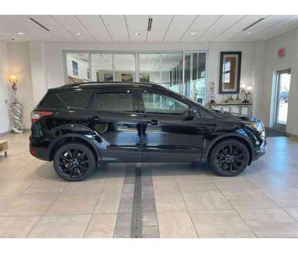 2018UsedFordUsedEscapeUsed4WD is a Black 2018 Ford Escape Car for Sale in Milwaukee WI