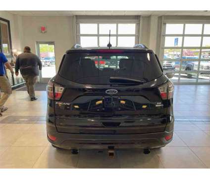 2018UsedFordUsedEscapeUsed4WD is a Black 2018 Ford Escape Car for Sale in Milwaukee WI