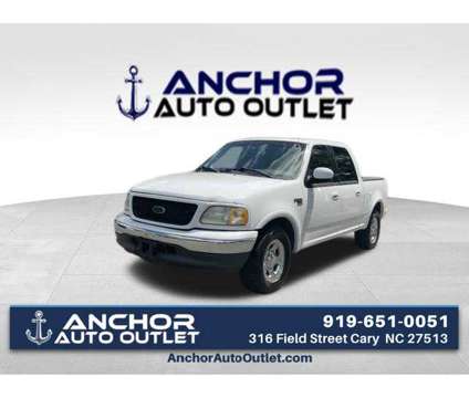 2001 Ford F-150 Lariat is a White 2001 Ford F-150 Lariat Truck in Cary NC