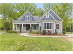 Custom craftsman style home in almost an acre lot in Waxhaw!