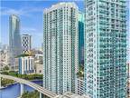 Experience Luxury and Convenience: Stunning 2/2 Condo at Brickell on the River