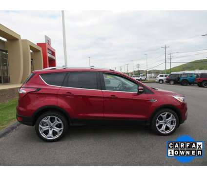 2017 Ford Escape Titanium is a Red 2017 Ford Escape Titanium Car for Sale in Pulaski VA