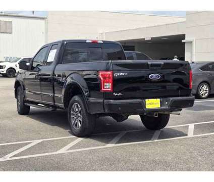 2016 Ford F-150 XLT is a Black 2016 Ford F-150 XLT Car for Sale in Houston TX