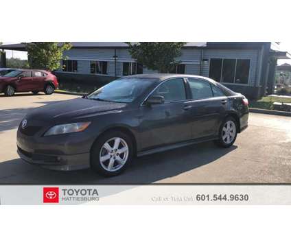 2009 Toyota Camry SE is a Grey 2009 Toyota Camry SE Car for Sale in Hattiesburg MS
