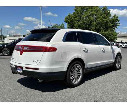 2019 Lincoln MKT Standard is a Silver, White 2019 Lincoln MKT Car for Sale in Southaven MS