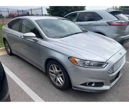 2016 Ford Fusion Se is a Silver 2016 Ford Fusion SE Car for Sale in Georgetown TX